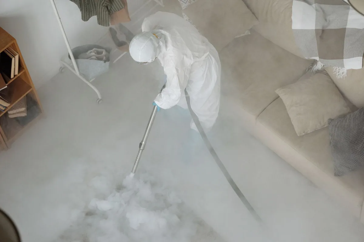 Biohazard cleanup technician in protective equipment, Cuthbert, GA